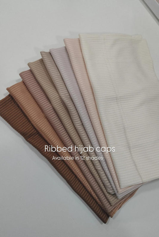 Ribbed tube caps
